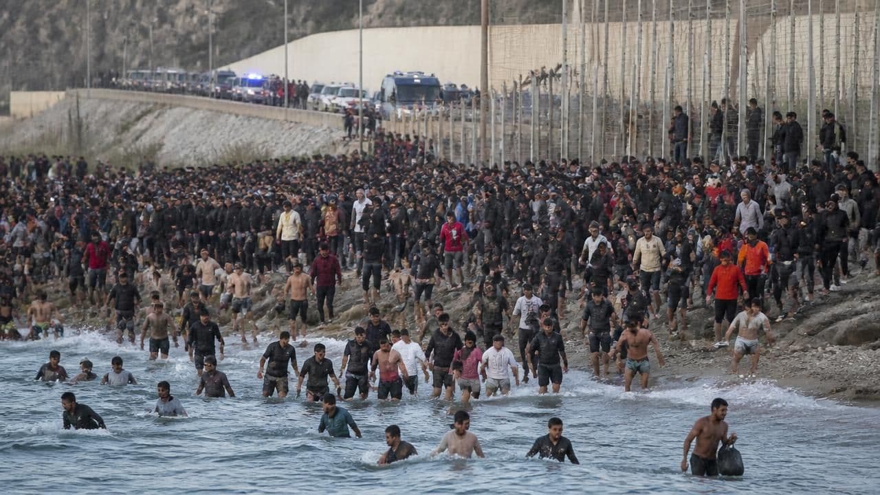 49,000 Migrants Storm Ceuta in a Day: Deaths, Military Response, and EU Tensions