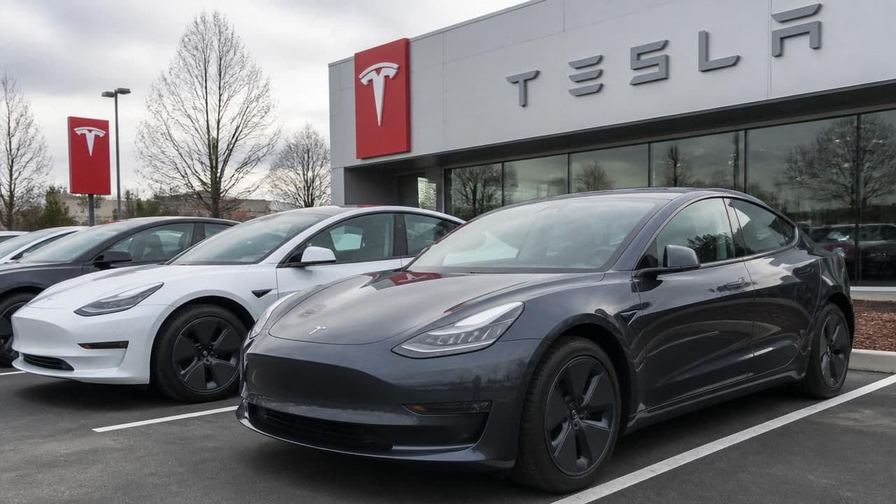 Tesla Sales Surge but Profits Slide as Costs, AI Spending Soar